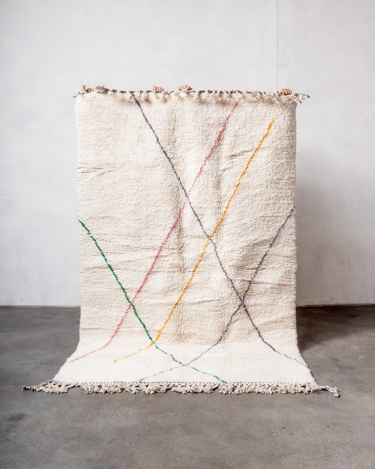 Modern, designer, handcrafted Berber rug from Morocco. Beniourain carpet with beautiful colours and patterns and fluffy wool texture.